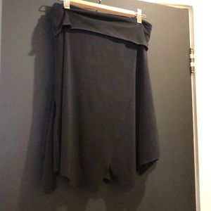 Jagged edge black skirt with gold over waist